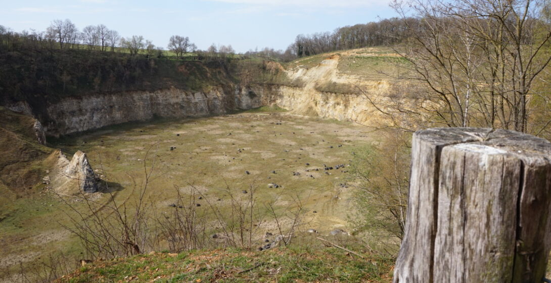 Walk along the top edge of the Curfsgroeve, a marl quarry from the 1930s.